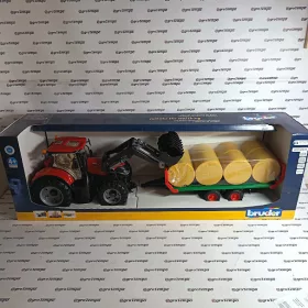   03198 BRUDER CASE IH Optum 300 CVX homlokrakodóval és bálaszállítóval - Bruder 3198